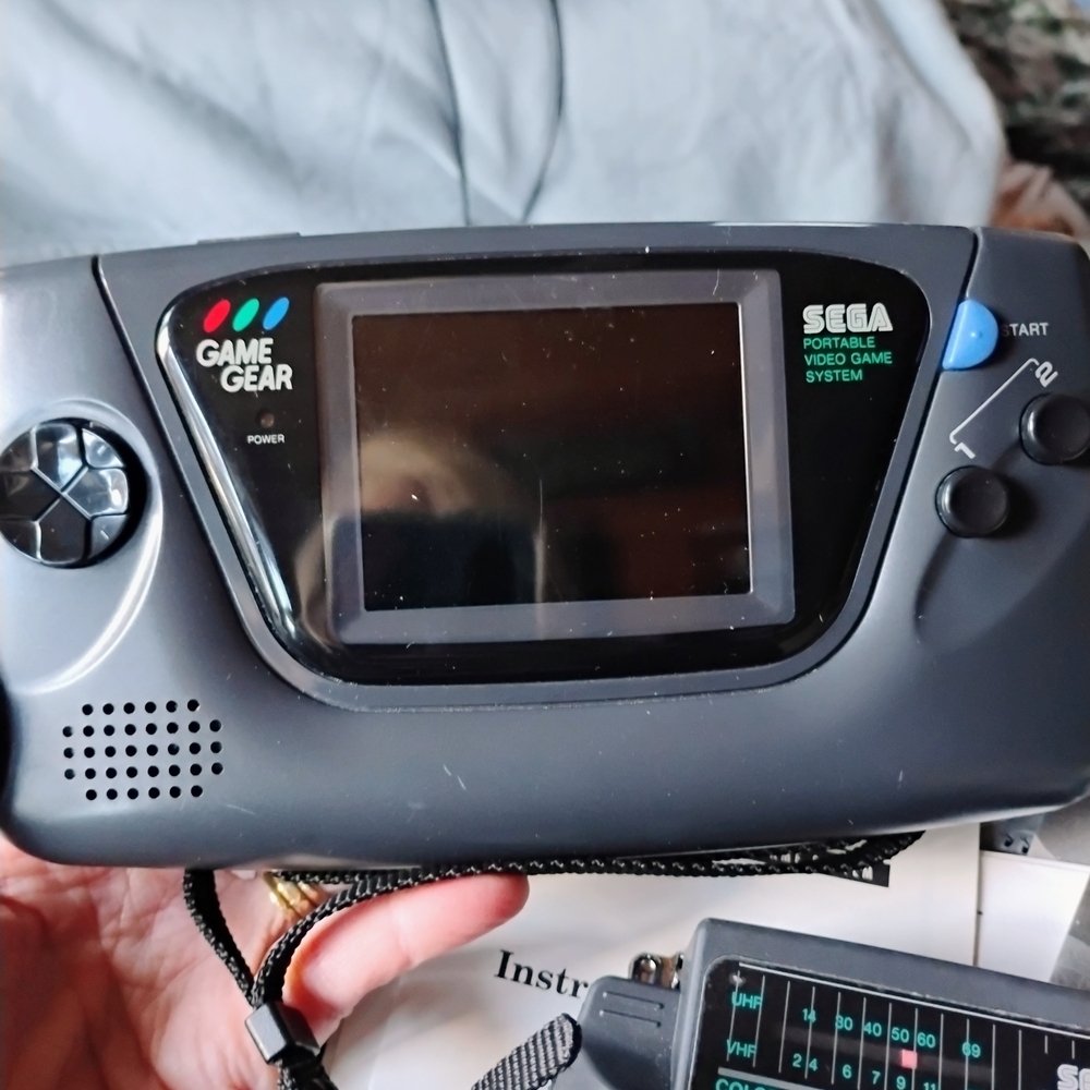 SEGA Game Gear Handheld Console No Scratches. Comes With TV Adapter And 6 Games